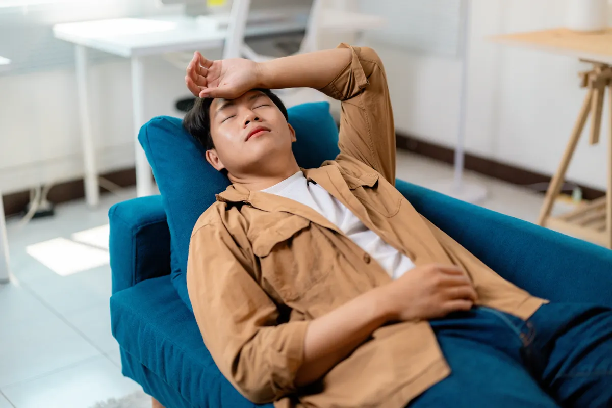 A man experiencing chronic fatigue