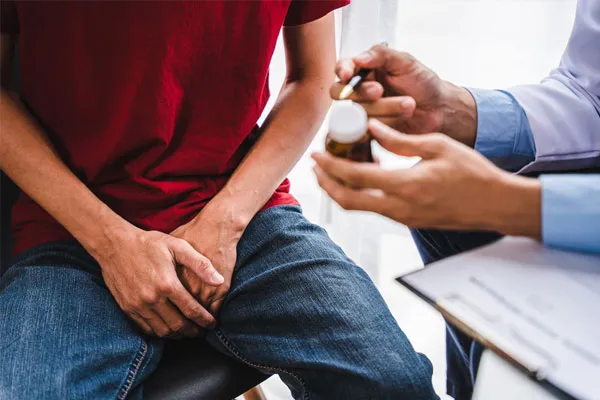 A doctor prescribing a patient with medication