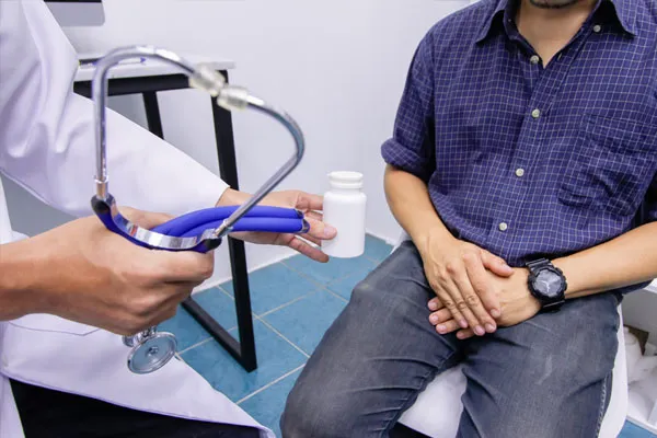 A patient consulting a men’s sexual health doctor