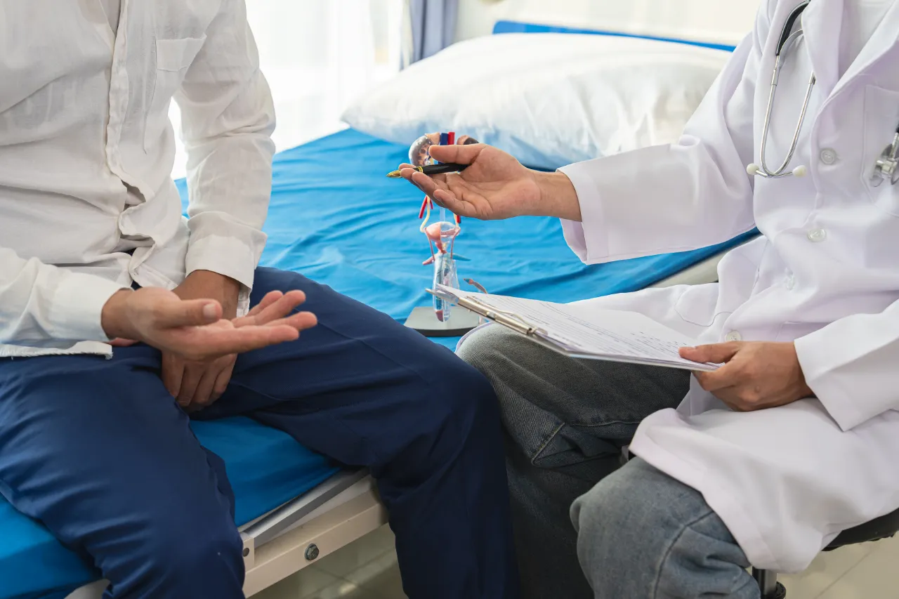 A circumcision specialist discussing the procedure with a patient